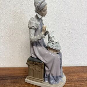 Lladro Gray and Cream Seated Lady Sculpture